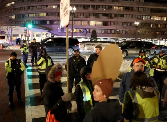 January 29, 2026, Washington Dc, Virginia, USA: Metropolitan police officers stop activists from marching to the John F. Kennedy Memorial Center For The Performing Arts, ahead of the screening of Ã’MelaniaO, the documentary about the US First Lady, Melania Trump, in Washington, DC, USA, on January 29, 2026. Ã’MelaniaO was directed by Brett Ratner, and Amazon paid 0 million to license the film, which follows the first lady in the twenty days before her return to the White House. Washington Dc USA - ZUMAs337 20260129_znp_s337_010 Copyright: xGentxShkullakux