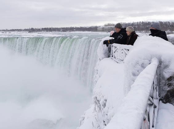 (260131) -- NIAGARA FALLS, Jan. 31, 2026 -- Visitors view Niagara Falls from the Canadian side in Niagara Falls, Ontario, Canada, on Jan. 30, 2026. (Photo by Xinhua) CANADA-ONTARIO-NIAGARA FALLS-WINTER VIEWS ZouxZheng 