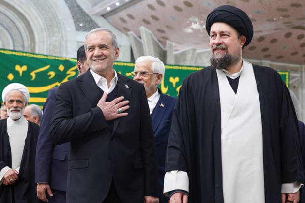 January 31, 2026, Tehran, Iran: Iranian President MASOUD PEZESHKIAN (L) and HASSAN KHOMEINI (R), the grandson of Ayatollah Rouhollah Khomeini, attend the ceremony of renewing allegiance with the ideals of the founder of the Islamic Republic at Ruhollah Khomeini mausoleum just outside Tehran. Tehran Iran - ZUMAi98_ 20260131_zih_i98_008 Copyright: xIranianxPresidencyx