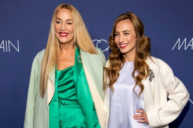 Jerry Hall and Elizabeth Jagger as guests on the red carpet at the Marc Cain Fashion Show Echo of now at Funkhaus Berlin on 30 01 2028 Berlin Germany
