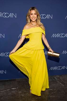 Sylvie Meis yellow dress as a guest on the red carpet at the Marc Cain Fashion Show Echo of now at Funkhaus Berlin on 30 01 2028 Berlin Germany