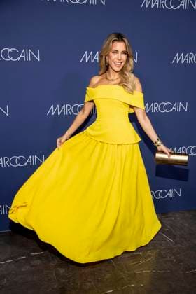 Sylvie Meis yellow dress as a guest on the red carpet at the Marc Cain Fashion Show Echo of now at Funkhaus Berlin on 30 01 2028 Berlin Germany