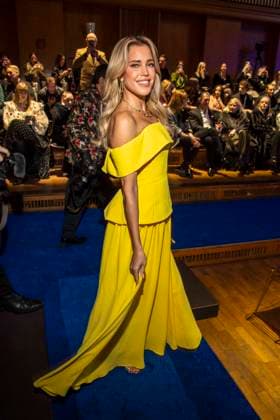 Sylvie Meis yellow dress as a guest at the Marc Cain Fashion Show Echo of now at Funkhaus Berlin on 30 01 2028 Berlin Germany