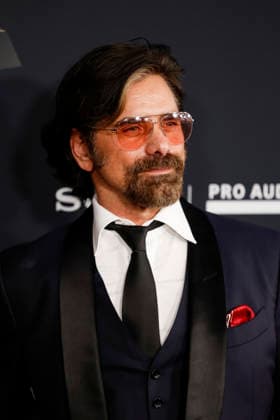 John Stamos arrives on the red carpet for the Pre-Grammy Gala on the eve of the 68th Annual Grammy Awards in Los Angeles on Saturday, January 31, 2026.  LAP20260131987 CAROLINExBREHMAN