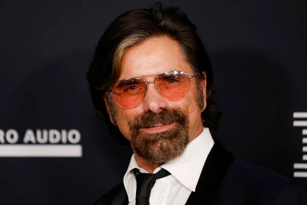 John Stamos arrives on the red carpet for the Pre-Grammy Gala on the eve of the 68th Annual Grammy Awards in Los Angeles on Saturday, January 31, 2026.  LAP20260131985 CAROLINExBREHMAN