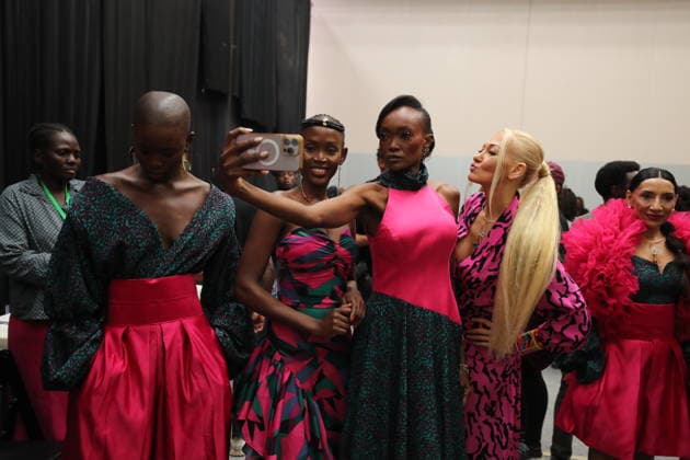 (260201) -- NAIROBI, Feb. 1, 2026 -- Models pose for selfies during the Nairobi Fashion Week at the Sarit Centre in Nairobi, Kenya, Jan. 31, 2026. (Photo by Xinhua) KENYA-NAIROBI-FASHION WEEK HenryxNaminde 