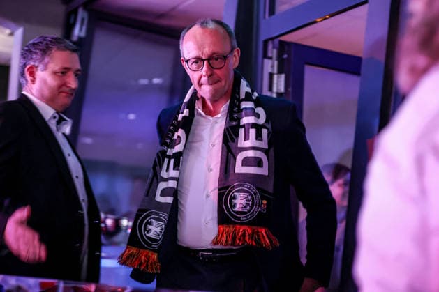 01 02 2026, Handball, Men s EHF EURO 2026, Germany Denmark, Jyske Bank Boxing in Herning, Final The German Chancellor Friedrich Merz Chancellor Politics Politician CDU with fan scarf around his neck Denmark