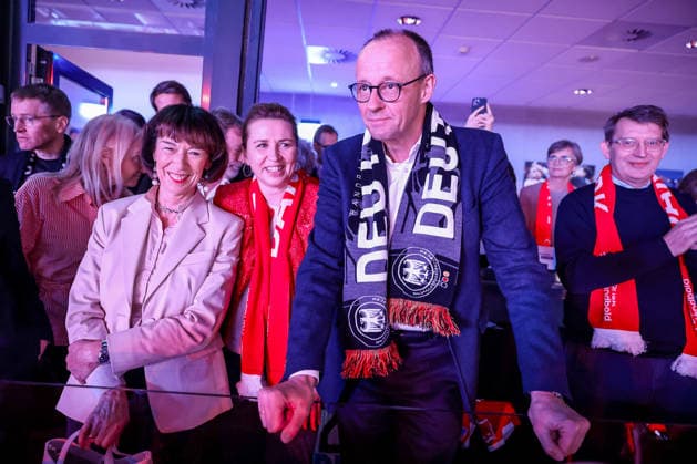 01 02 2026, Handball, Men s EHF EURO 2026, Germany Denmark, Jyske Bank Boxing in Herning, Final The German Chancellor Friedrich Merz Chancellor Politician CDU follows the game with fan scarf around his neck together with wife Charlotte Merz left and The Danish Prime Minister Mette Frederiksen Prime Minister Denmark Politician Politician with Denmark