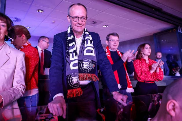 01 02 2026, Handball, Men s EHF EURO 2026, Germany Denmark, Jyske Bank Boxing in Herning, Final The German Chancellor Friedrich Merz Chancellor Politician CDU follows the game with fan scarf around his neck Denmark