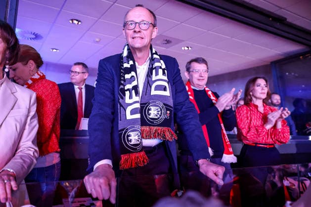 01 02 2026, Handball, Men s EHF EURO 2026, Germany Denmark, Jyske Bank Boxing in Herning, Final The German Chancellor Friedrich Merz Chancellor Politician CDU follows the game with fan scarf around his neck Denmark