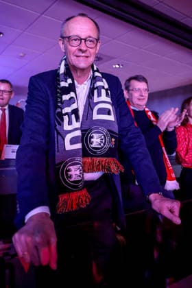 01 02 2026, Handball, Men s EHF EURO 2026, Germany Denmark, Jyske Bank Boxing in Herning, Final The German Chancellor Friedrich Merz Chancellor Politician CDU follows the game with fan scarf around his neck Denmark