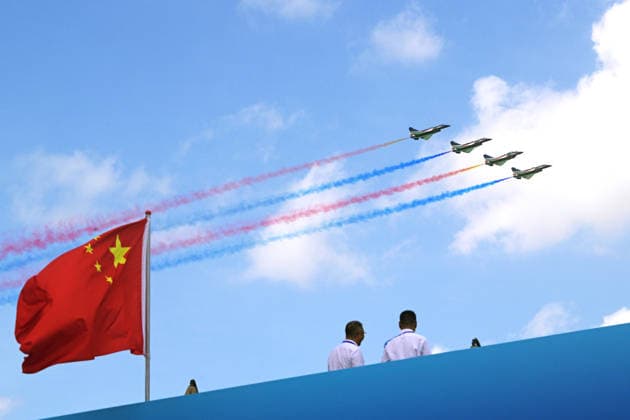 (260203) -- SINGAPORE, Feb. 3, 2026 -- Aircraft of the Bayi Aerobatic Team of the Chinese People s Liberation Army (PLA) Air Force perform during the 10th Singapore Airshow in Singapore, Feb. 3, 2026. The 10th Singapore Airshow opened on Tuesday at the Changi Exhibition Center, with the Bayi Aerobatic Team of the Chinese PLA Air Force delivering a flight display featuring six J-10 fighter jets. The performance marked the first public appearance in Singapore by the team after it transitioned to the J-10C aircraft. (Photo by Xinhua) SINGAPORE-AIRSHOW-CHINESE PLA-AEROBATIC TEAM-PERFORMANCE ThenxChihxWey 
