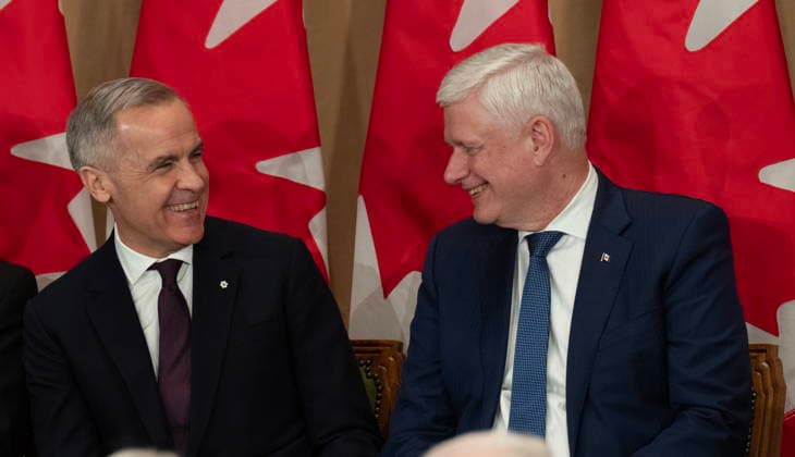 February 3, 2026, Ottawa, On, Canada: Former prime minister Stephen Harper, right, and Prime Minister Mark Carney share a laugh during a ceremony for Harper s official portrait unveiling in Ottawa, on Tuesday, Feb 3, 2026. Ottawa Canada  - ZUMAc35_ 20260203_zaf_c35_084 Copyright: xAdrianxWyldx