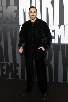 Marty Supreme Paris Film Premiere NB Adil Rami attends Marty Supreme Paris Film Premiere at Le Grand REX on February 03, 2026 in Paris, France. Photo by Nasser Berzane ABACAPRESS.COM Paris France  Copyright: xBerzanexNasser ABACAx