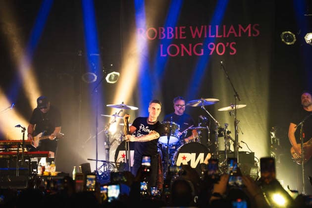 Robbie Williams performing at Barrowlands in Glasgow on 04 February 2026. Robbie Williams performing at Barrowlands in Glasgow on 04 February 2026 as part of his Long 90™s tour performing ˜Life Thru a Lens™ and new album ˜Britpop™ in full. Robbie Williams is a British singer and songwriter best known for solo singles ˜Angels™ and ˜Feel™ and as a member of the pop group Take That., Credit:Adam Hampton-Matthews Avalon  Copyright: xAdamxHampton-Matthewsx xAvalonx 1072124738