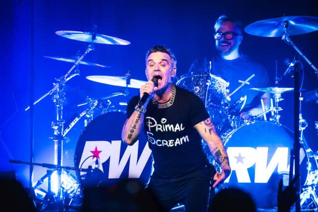 Robbie Williams performing at Barrowlands in Glasgow on 04 February 2026. Robbie Williams performing at Barrowlands in Glasgow on 04 February 2026 as part of his Long 90™s tour performing ˜Life Thru a Lens™ and new album ˜Britpop™ in full. Robbie Williams is a British singer and songwriter best known for solo singles ˜Angels™ and ˜Feel™ and as a member of the pop group Take That., Credit:Adam Hampton-Matthews Avalon  Copyright: xAdamxHampton-Matthewsx xAvalonx 1072124834