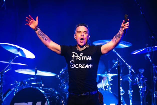 Robbie Williams performing at Barrowlands in Glasgow on 04 February 2026. Robbie Williams performing at Barrowlands in Glasgow on 04 February 2026 as part of his Long 90™s tour performing ˜Life Thru a Lens™ and new album ˜Britpop™ in full. Robbie Williams is a British singer and songwriter best known for solo singles ˜Angels™ and ˜Feel™ and as a member of the pop group Take That., Credit:Adam Hampton-Matthews Avalon  Copyright: xAdamxHampton-Matthewsx xAvalonx 1072124862