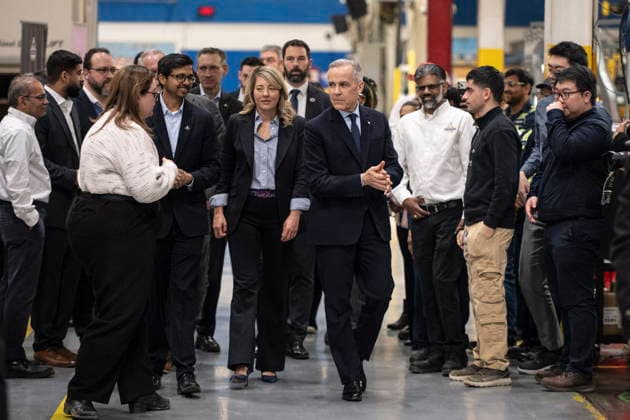 February 5, 2026, Woodbridge, Ontario, CANADA: Prime Minister Mark Carney, centre right, walks with Industry Minister Mo lanie Joly, centre, as they arrive for a visit to an auto-parts plant in Woodbridge, Ont., February 5, 2026. Woodbridge CANADA - ZUMAc35_ 20260205_zaf_c35_085 Copyright: xEduardoxLimax