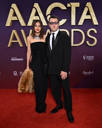 AACTA AWARDS 2026, Joel Edgerton (right) and partner Christine Centenera (left) are seen posing for a photo on the red carpet at the 2024 AACTA Awards at HOTA in Surfers Paradise, Queensland, Friday, February 6, 2026. ( NO ARCHIVING BRISBANE QUEENSLAND AUSTRALIA  Copyright: xDARRENxENGLANDx 20260206112552239175