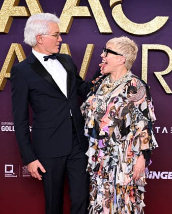 AACTA AWARDS 2026, Baz Luhrmann (left) and Catherine Martin (right) are seen posing for a photo on the red carpet at the 2024 AACTA Awards at HOTA in Surfers Paradise, Queensland, Friday, February 6, 2026. ( NO ARCHIVING BRISBANE QUEENSLAND AUSTRALIA Copyright: xDARRENxENGLANDx 20260207129268769852