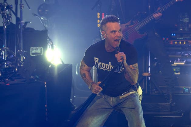 Robbie Williams performs live at the Liverpool Olympia Featuring: Robbie Williams Where: Liverpool, Merseyside, United Kingdom When: 06 Feb 2026 Credit: Alex Cropper Cover Images EDITORIAL USE ONLY. NOT FOR USE BY NEWSPAPERS BASED IN THE UK. Copyright: xx coverimg55443504