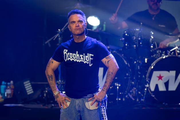 Robbie Williams performs live at the Liverpool Olympia Featuring: Robbie Williams Where: Liverpool, Merseyside, United Kingdom When: 06 Feb 2026 Credit: Alex Cropper Cover Images EDITORIAL USE ONLY. NOT FOR USE BY NEWSPAPERS BASED IN THE UK. Copyright: xx coverimg55443508