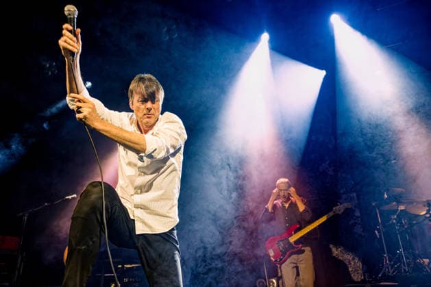 February 6, 2026, Liverpool, United Kingdom: Brett Anderson in foreground with microphone aloft and Matt Osman on bass in background Of Uk band Suede on stage at Liverpool University UK band Suede performing on stage at Liverpool University, Mountford Hall, UK as part of their 2026 ˜Antidepressants™ tour Liverpool United Kingdom - ZUMAs197 20260206_aaa_s197_383 Copyright: xAndyxVonxPipx