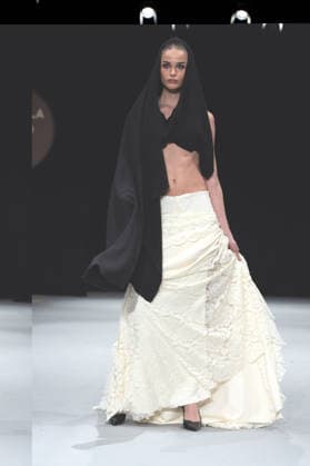 Modad catwalk during Madrid Fashion Week in Madrid - 07 Feb 2026 A model walks the runway in a design by designer CSDMM at the Momad catwalk during the Madrid Fashion Week at Ifema. Madrid Spain Copyright: xAtilanoxGarciax xSOPAxImagesx photos04471
