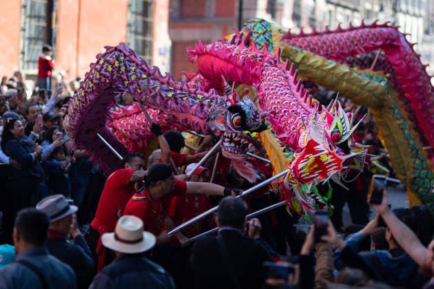 Chinese New Year celebrations in Mexico City MEXICO CITY, MEXICO - FEBRUARY 07: Dragon dancers take part in a parade as spectators watch, during Chinese New Year celebrations through the streets of the city center, in Mexico City, Mexico on February 07, 2026. Dozens of dragon and lion dancers paraded close to spectators in Mexico City s center, marking the start of Chinese New Year celebrations, the Year of the Horse. Daniel Cardenas Anadolu Mexico City Mexico. Editorial use only. Please get in touch for any other usage.  Copyright: x2026xAnadoluxDanielxCardenasx