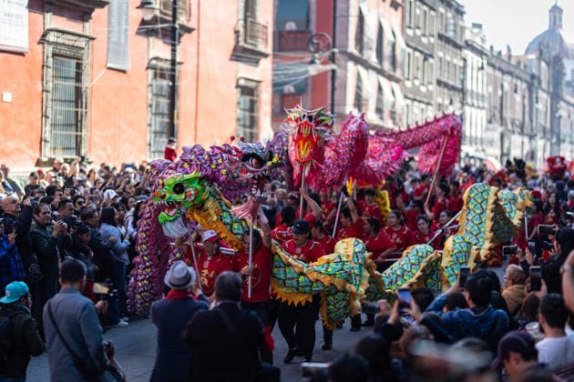 Chinese New Year celebrations in Mexico City MEXICO CITY, MEXICO - FEBRUARY 07: Dragon dancers take part in a parade as spectators watch, during Chinese New Year celebrations through the streets of the city center, in Mexico City, Mexico on February 07, 2026. Dozens of dragon and lion dancers paraded close to spectators in Mexico City s center, marking the start of Chinese New Year celebrations, the Year of the Horse. Daniel Cardenas Anadolu Mexico City Mexico. Editorial use only. Please get in touch for any other usage.  Copyright: x2026xAnadoluxDanielxCardenasx