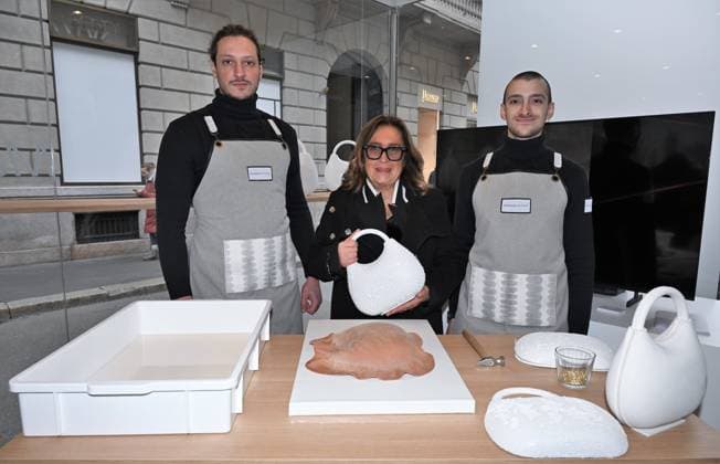 Milan, Italy The Luxury Icons inauguration and presentation at the MonteNapoleone District, the initiative included in the program of the Cultural Olympics of Milan Cortina 2026. In the photo: Barbara Ricci AD Giorgio Linea in the event space with artisans  Copyright: xNickxZonnax xipa-agency.netx xNickxZonnax IPA_Agency_IPA71223178