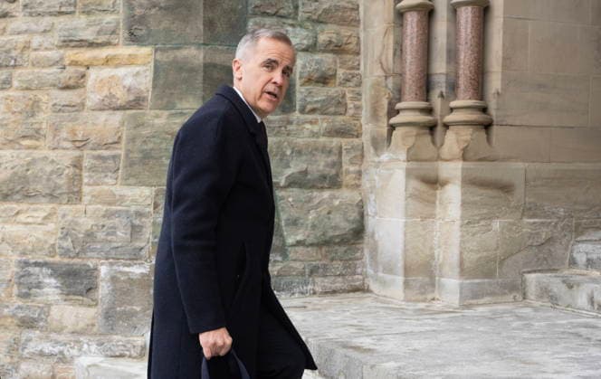 February 10, 2026, Ottawa, On, Canada: Prime Minister Mark Carney speaks with photographers as he arrives on Parliament Hill in Ottawa, Tuesday, Feb. 10, 2026. Ottawa Canada  - ZUMAc35_ 20260210_zaf_c35_100 Copyright: xAdrianxWyldx
