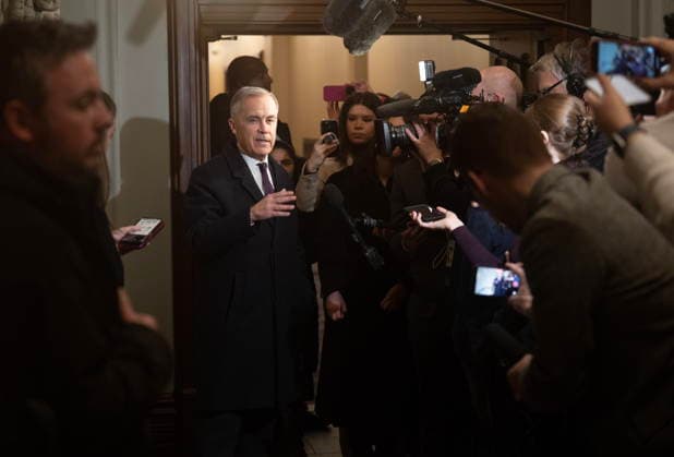 February 10, 2026, Ottawa, On, Canada: Prime Minister Mark Carney speaks with reporters as he arrives on Parliament Hill in Ottawa, Tuesday, Feb. 10, 2026. Ottawa Canada  - ZUMAc35_ 20260210_zaf_c35_108 Copyright: xAdrianxWyldx