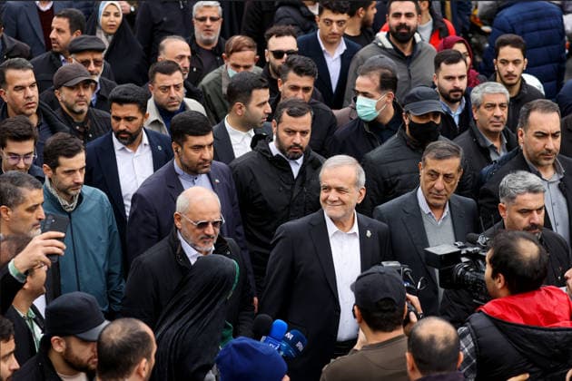 February 11, 2026, Tehran, Iran: Iranian President MASOUD PEZESHKIAN (C) takes part in a celebration marking the 47th anniversary of the Islamic Revolution in Tehran. This anniversary commemorates the 1979 revolution, during which the monarchy was overthrown and replaced by the Islamic Republic of Iran, with Ayatollah Ruhollah Khomeini as its first Supreme Leader. Tehran Iran - ZUMAi98_ 20260211_zih_i98_004 Copyright: xIranianxPresidencyx