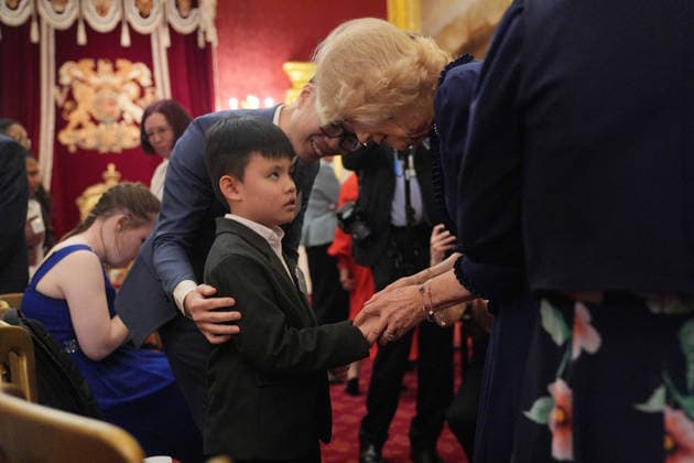 Queen Camilla hosts The Amber Trust reception Queen Camilla meets a child after he took part in a musical performance from members of The Amber Trust before a reception to celebrate 30 years of the charity, which provides musical opportunities for blind and partially sighted children, including children with more complex needs, at St James Palace, London. Picture date: Tuesday February 10, 2026., Credit:Yui Mok Avalon UK, London  Copyright: xYuixMokx xAvalonx 1073948717