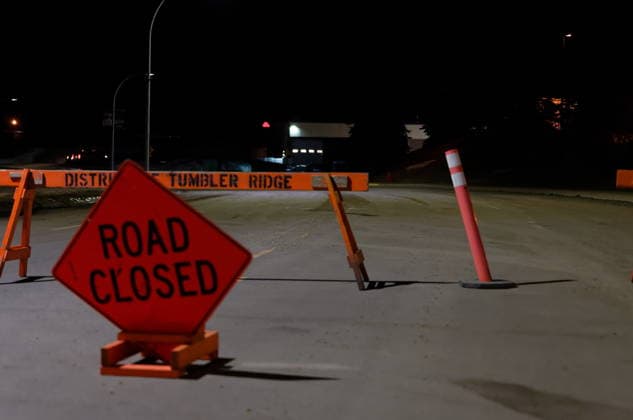 February 11, 2026, Tumbler Ridge, Bc, CANADA: The road is blocked off before the Tumbler Ridge Secondary School in Tumbler Ridge, B.C. on Wednesday, Feb. 11, 2026. Tumbler Ridge CANADA  - ZUMAc35_ 20260211_zaf_c35_011 Copyright: xJessexBoilyx