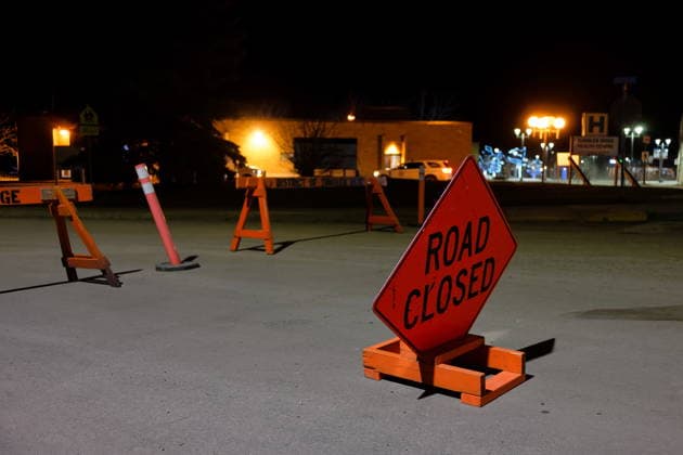 February 11, 2026, Tumbler Ridge, Bc, CANADA: The road is blocked off before the Tumbler Ridge Secondary School in Tumbler Ridge, B.C. on Wednesday, Feb. 11, 2026. Tumbler Ridge CANADA  - ZUMAc35_ 20260211_zaf_c35_014 Copyright: xJessexBoilyx