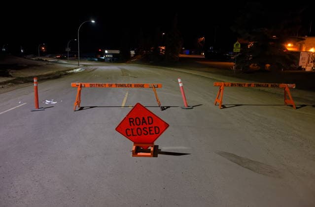 February 11, 2026, Tumbler Ridge, Bc, CANADA: The road is blocked off before the Tumbler Ridge Secondary School in Tumbler Ridge, B.C. on Wednesday, Feb. 11, 2026. Tumbler Ridge CANADA  - ZUMAc35_ 20260211_zaf_c35_015 Copyright: xJessexBoilyx
