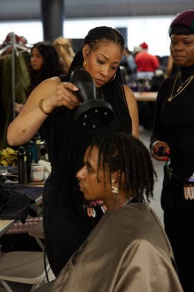 February 11, 2026, New York, New York, USA: Hair and makeup artists prepare looks backstage ahead of MenÃ¢â‚¬â ¢s Day FW26 presentations during New York Fashion Week in New York City. New York USA  - ZUMAs237 20260211_aap_s237_001 Copyright: xMarkxJ.xSullivanx