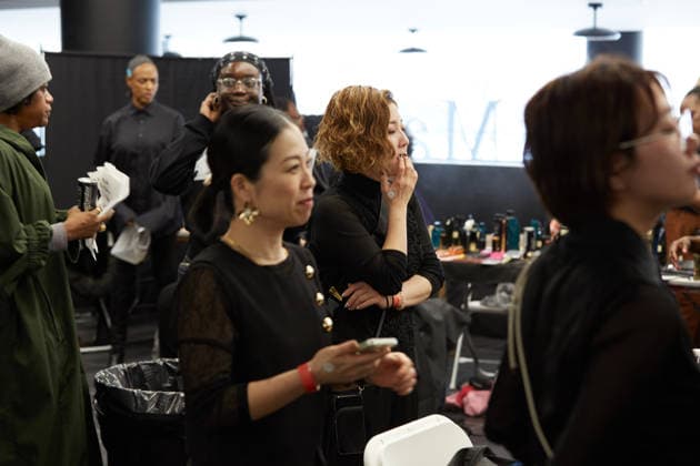 February 11, 2026, New York, New York, USA: Hair and makeup artists prepare looks backstage ahead of MenÃ¢â‚¬â ¢s Day FW26 presentations during New York Fashion Week in New York City. New York USA  - ZUMAs237 20260211_aap_s237_006 Copyright: xMarkxJ.xSullivanx