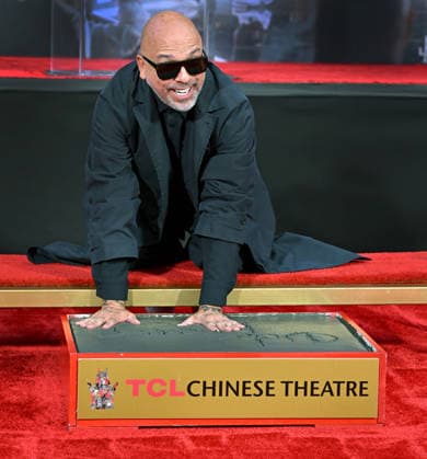 Comedian and actor Jo Koy gets his hands on cement as he is honored with a hand and footprint ceremony in the forecourt of the TCL Chinese Theatre in Los Angeles, California on Wednesday, February 11, 2026.  LAP20260211700a CHRISxCHEW