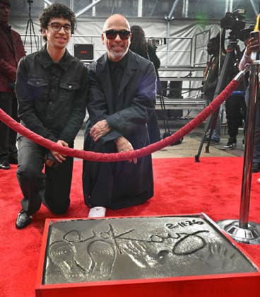 Jo Koy (R) and his son Joseph Herbert Jr. attend a hand and footprint ceremony honoring Koy in the forecourt of the TCL Chinese Theatre in Los Angeles, California on Wednesday, February 11, 2026.  LAP20260211721 CHRISxCHEW