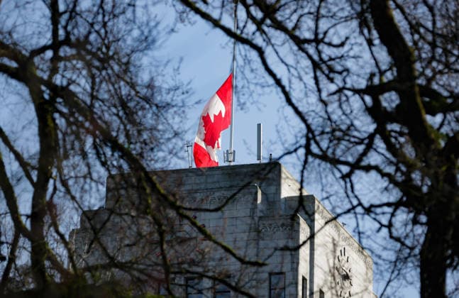 (260212) -- VANCOUVER, Feb. 12, 2026 -- The Canadian national flag flies at half-mast over Vancouver City Hall in Vancouver, British Columbia, Canada, Feb. 11, 2026. Canadian Prime Minister Mark Carney on Wednesday ordered all flags on Parliament Hill and federal buildings across Canada to be flown at half-mast for seven days as the country mourns the victims of a mass shooting in Tumbler Ridge, British Columbia province. The shooting claimed 10 lives, including the shooter, making it one of the deadliest mass shootings in Canadian history. (Photo by Xinhua) CANADA-VANCOUVER-MASS SHOOTING-FLAGS-HALF-MAST LiangxSen 