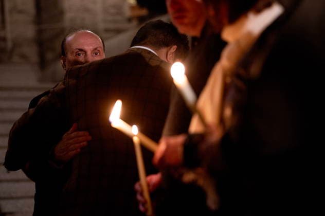 February 11, 2026, Victoria, Bc, CAN: Speaker of the B.C. Legislative Assembly Raj Chouhan hugs people at a candle light vigil at the front steps of the legislature in Victoria, B.C., on Wednesday, Feb. 11, 2026 in honour of the victims of the school shooting in Tumbler Ridge, B.C. Victoria CAN  - ZUMAc35_ 20260211_zaf_c35_332 Copyright: xChadxHipolitox