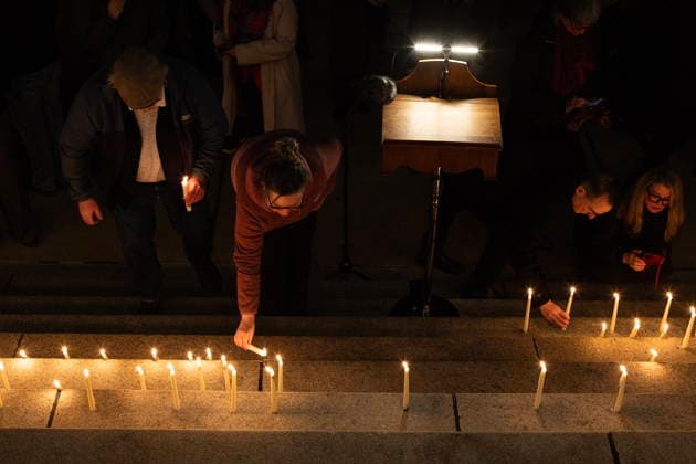 February 11, 2026, Victoria, Bc, CAN: People attend a candle light vigil at the front steps of the legislature in Victoria, B.C., on Wednesday, Feb. 11, 2026 in honour of the victims of the school shooting in Tumbler Ridge, B.C. Victoria CAN  - ZUMAc35_ 20260211_zaf_c35_333 Copyright: xChadxHipolitox