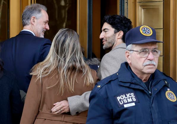 Justin Baldoni arrives at U.S. District Court in Manhattan with Emily Baldoni regarding his case against Jonesworks PR boss Stephanie Jones, whom he sued in March 2025. on Thursday, February 12, 2026 in New York City. Justin Baldoni and Jennifer Abel have filed a lawsuit against publicist Stephanie Jones as part of the ongoing legal battle between the It Ends With Us director and cast member Blake Lively.  NYP20260212102 JOHNxANGELILLO