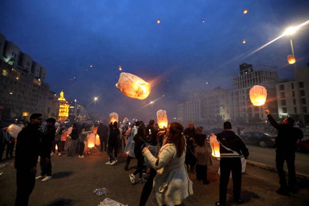 February 12, 2026, Beirut, Beirut, Lebanon: Supporters of assassinated Prime Minister Rafic al-Hariri release paper lanterns on the eve of the 21st anniversary of his death at Beirut Martyr Square. Hariri was assassinated along with 21 others in an explosion 14 February 2005. Beirut Lebanon - ZUMAn313 20260212_zip_n313_001 Copyright: xMarwanxNaamanix
