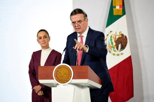 Mexico™s President Claudia Sheinbaum News Conference Mexico™s President Claudia Sheinbaum Pardo is seen behind while Mexico s Economic Minister, Marcelo Ebrard Casaubon speak during a briefing about the mineral concessions recovered by the State at National Palace. on February 12, 2026 in Mexico City, Mexico. (Photo by Luis Barron Eyepix Group) Copyright: xLuisxBarronx xEyepixxGroupx LB_12022026_175930