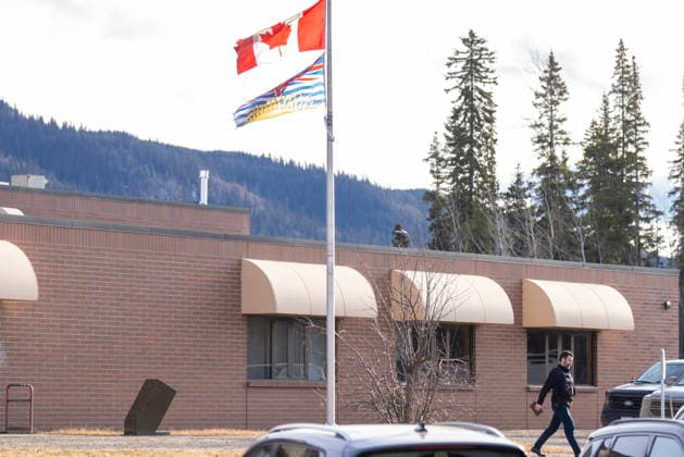 February 12, 2026, Tumbler Ridge, Bc, CANADA: An RCMP officer walks out of the school where a mass shooting took place in Tumbler Ridge, B.C., on Thursday, Feb. 12, 2026. Tumbler Ridge CANADA  - ZUMAc35_ 20260212_zaf_c35_202 Copyright: xChristinnexMuschix