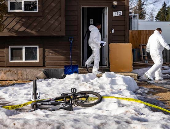 February 12, 2026, Tumbler Ridge, Bc, CANADA: Police investigators work at the home where two bodies were found in Tumbler Ridge, B.C., on Thursday, Feb. 12, 2026. Tumbler Ridge CANADA  - ZUMAc35_ 20260212_zaf_c35_231 Copyright: xChristinnexMuschix